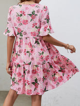 Robe imprimée à col en V et longueur genou